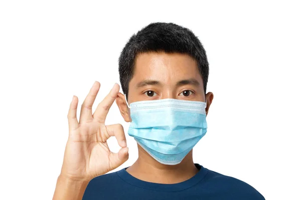Young Man Wearing Protective Face Mask Shows Sign Isolated White — Stock Photo, Image