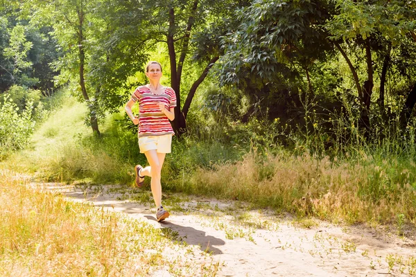 Senior Woman Running in the Forest — Stock Photo, Image