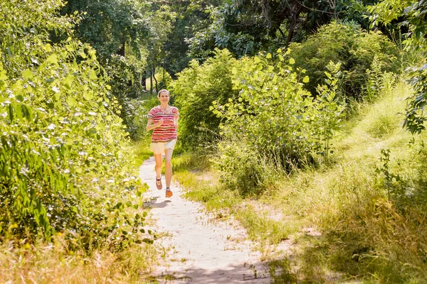 Senior Woman Running in the Forest — Stock Photo, Image