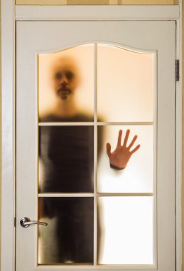 Man behind the Glass Door clipart