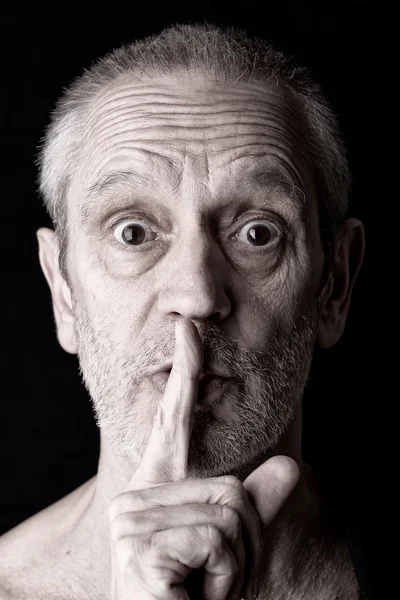 Dorosły człowiek mówi cisza — Zdjęcie stockowe