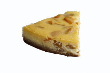 Dilim şeftali Cheesecake beyaz bir arka plan ile 