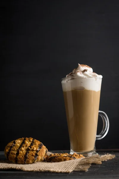 Glass of coffee with cookies — Stock Photo, Image