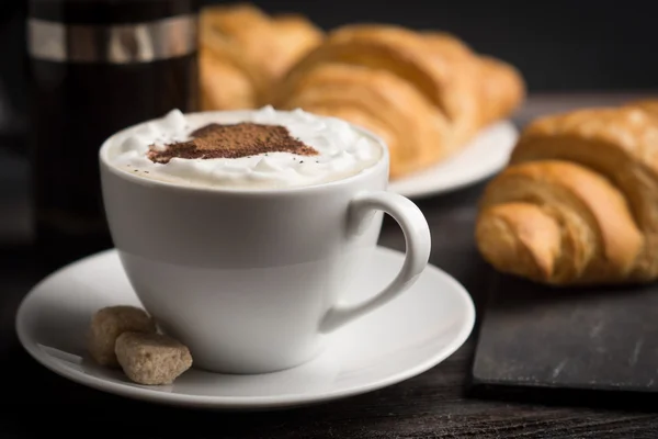 Croissants with cup of coffee — Stock Photo, Image