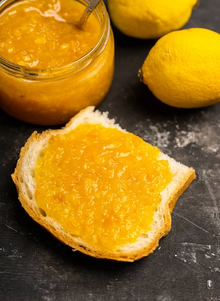 Slice Freshly Baked Rural Bread Homemade Citrus Jam Selective Focus — Stock Photo, Image
