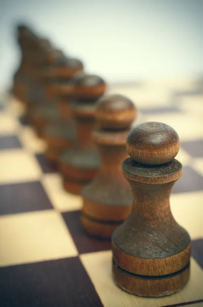 Csapat gyalog a sakktáblán. — Stock Fotó