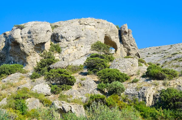 Berglandschaft. Höhlen. Stockbild