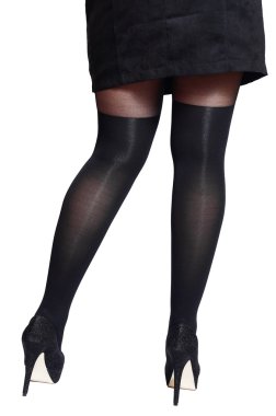 Güzel seksi kadın bacaklar fiyonk ile siyah tayt