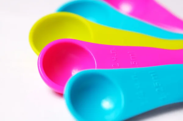Multicolored measuring spoons. — Stock Photo, Image