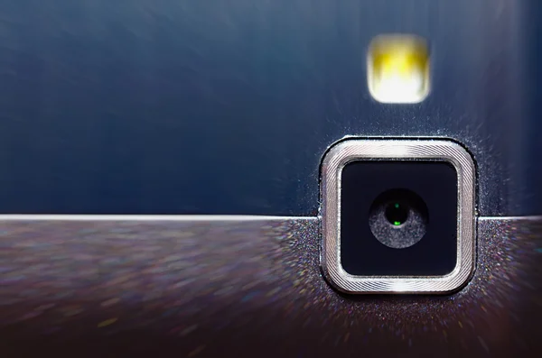 Spindelväv kamera och blixt din mobiltelefon. — Stockfoto