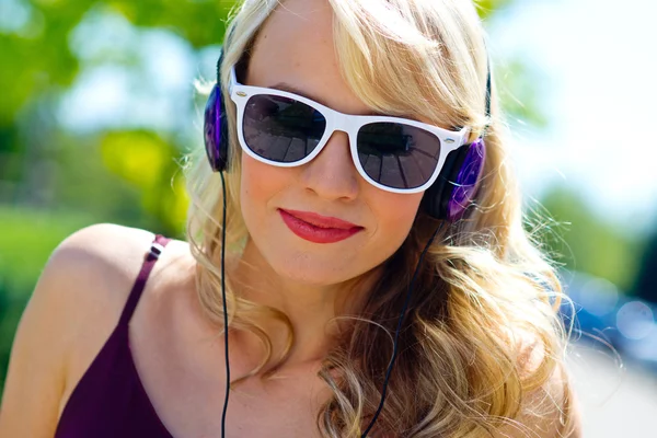 Attractive young woman with headphones — Stock Photo, Image