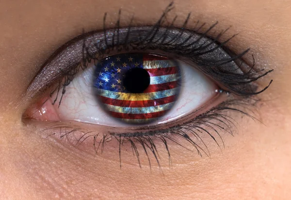 Olho de mulher com bandeira dos EUA — Fotografia de Stock