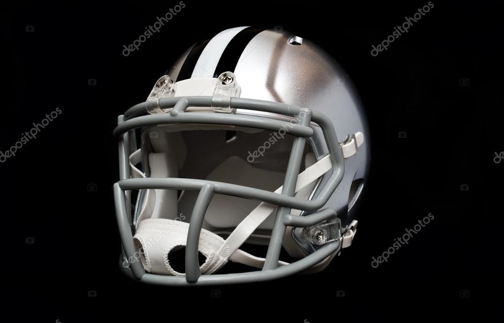 Silver american football helmet isolated on black background