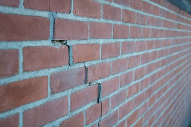 Crack in Brick Wall caused by subsidence clipart