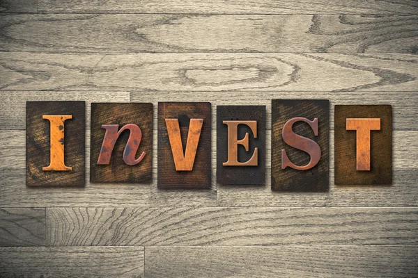 Invest Concept Wooden Letterpress Type — Stock Photo, Image