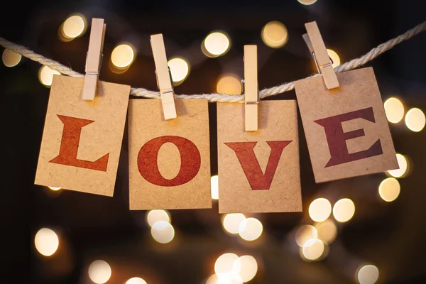 Love Concept Clipped Cards and Lights — Stock Photo, Image