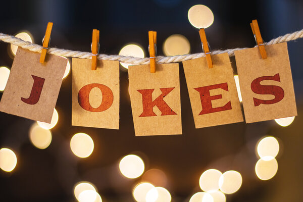 Jokes Concept Clipped Cards and Lights Royalty Free Stock Images