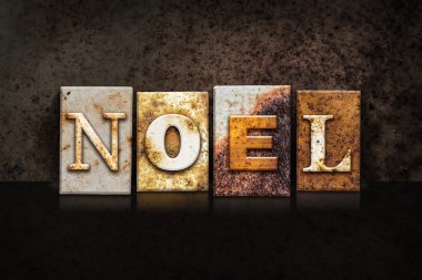 Noel Letterpress kavramı koyu arka plan üzerinde