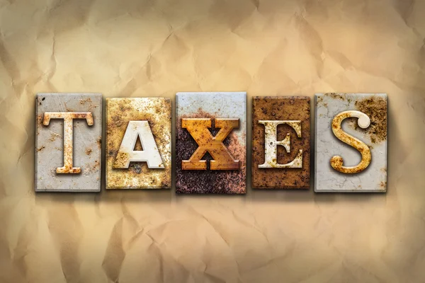 Taxes Concept Rusted Metal Type — Stock Photo, Image