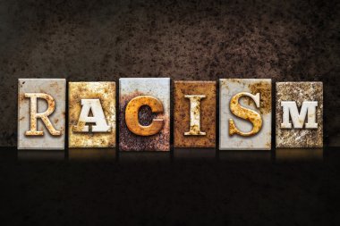 Racism Letterpress Concept on Dark Background clipart
