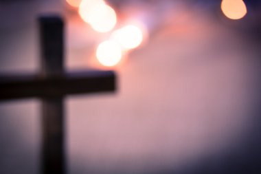 Blurred Christian Cross and Bokeh Lights clipart