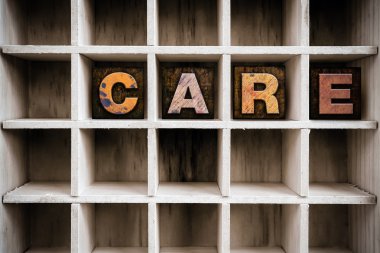 Care Concept Wooden Letterpress Type in Draw