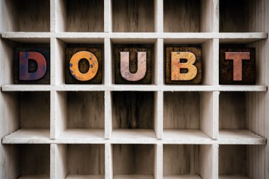 Doubt Concept Wooden Letterpress Type in Draw