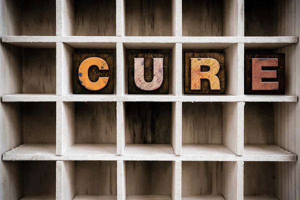 Cure Concept Wooden Letterpress Type in Draw — Stockfoto