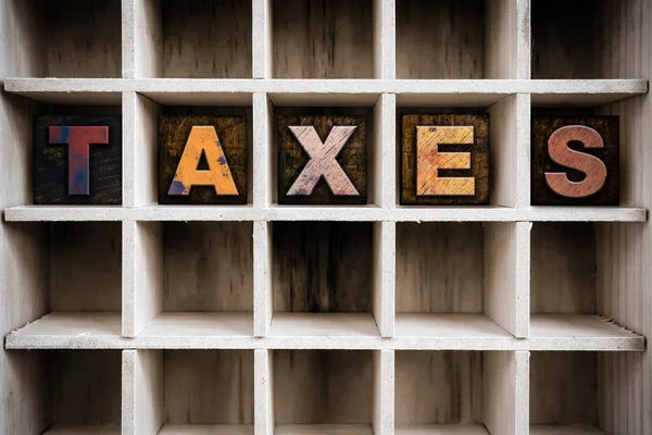 Taxes Concept Wooden Letterpress Type in Drawer — Stock fotografie