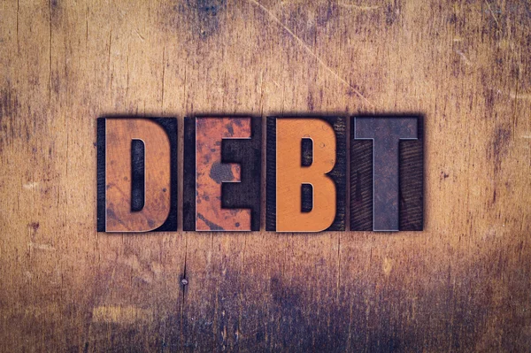 Debt Concept Wooden Letterpress Type — Stock Photo, Image