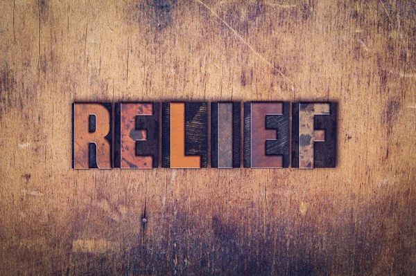 Relief Concept Wooden Letterpress Type — Stock Photo, Image