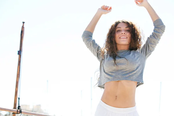 Young woman feeling happy — Stok fotoğraf