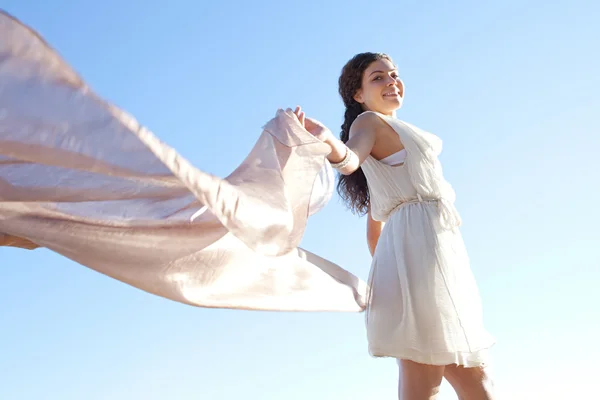 Elegant smiling woman with silk fabric — Stock Photo, Image