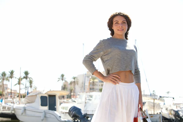Woman on yachts marine pier — Stockfoto