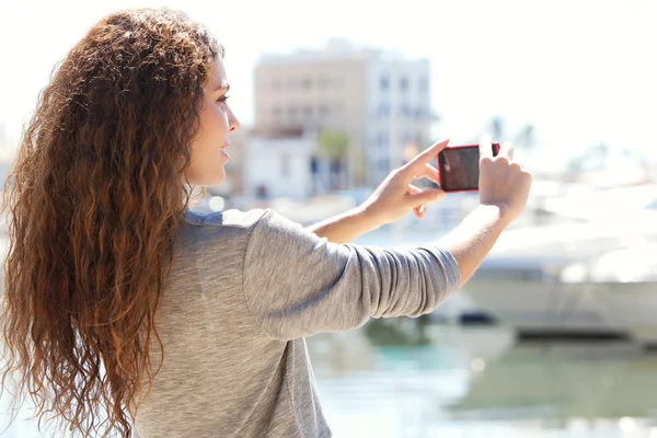 Beautiful woman  take photos — Stock fotografie