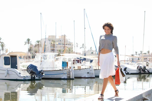 Woman on yachts marine pier — Stok fotoğraf