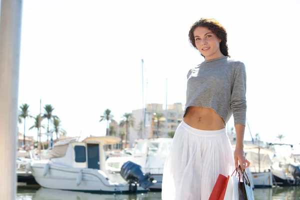 Woman on yachts marine pier — Stok fotoğraf