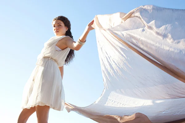 Elegant smiling woman with silk fabric — Stock Photo, Image