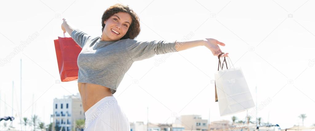 woman with shopping bags