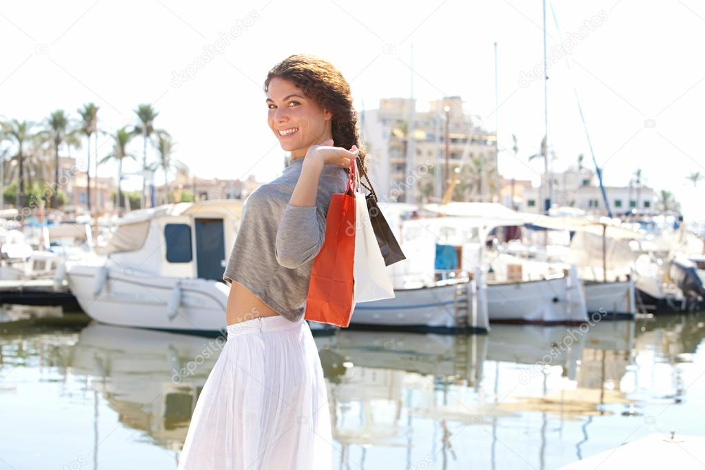 Woman on yachts marine pier