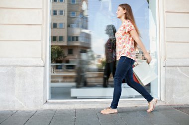 walking passed a shopping mall