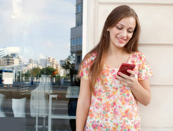 Woman using a smartphone mobile — Stock Photo, Image