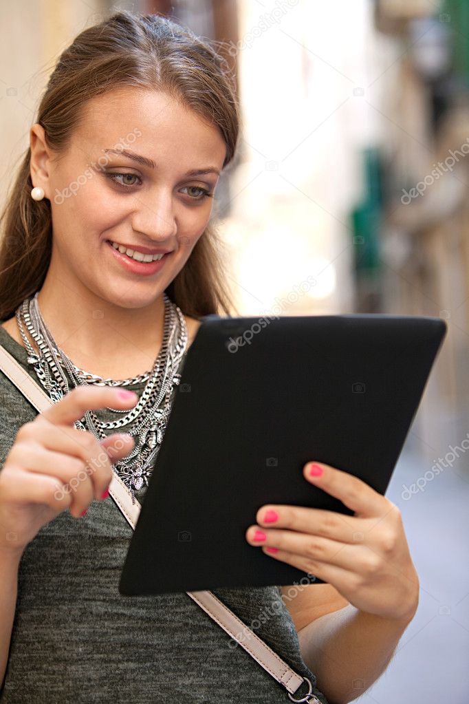 woman using a digital tablet