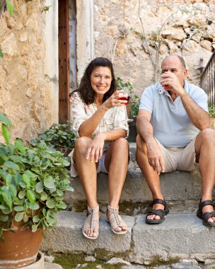 Couple drinking wine in the resort