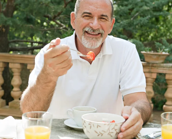 Man having a breakfast — Stock Photo, Image