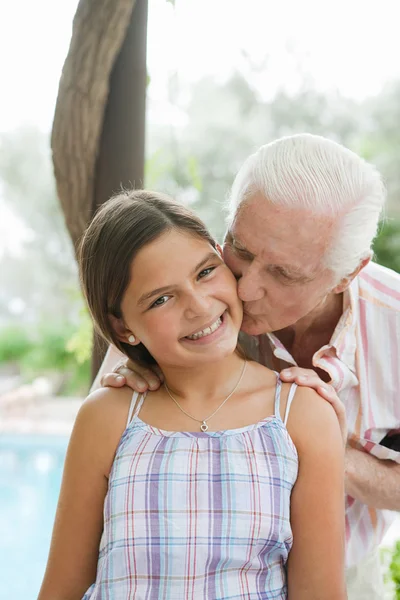 Portrait of a young granddaughter and hes grandfather — Stock Fotó