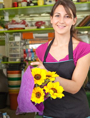 florist woman works in her store