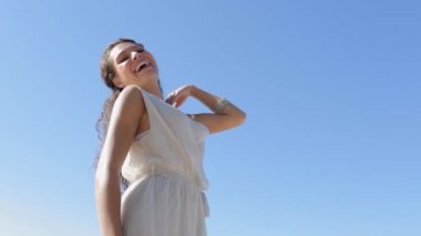 woman smiling and turning to the camera