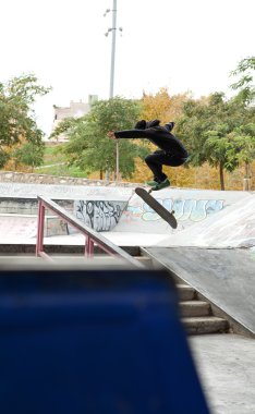 skater silhouette jumping up in the air