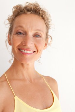 mature woman enjoying life and smiling